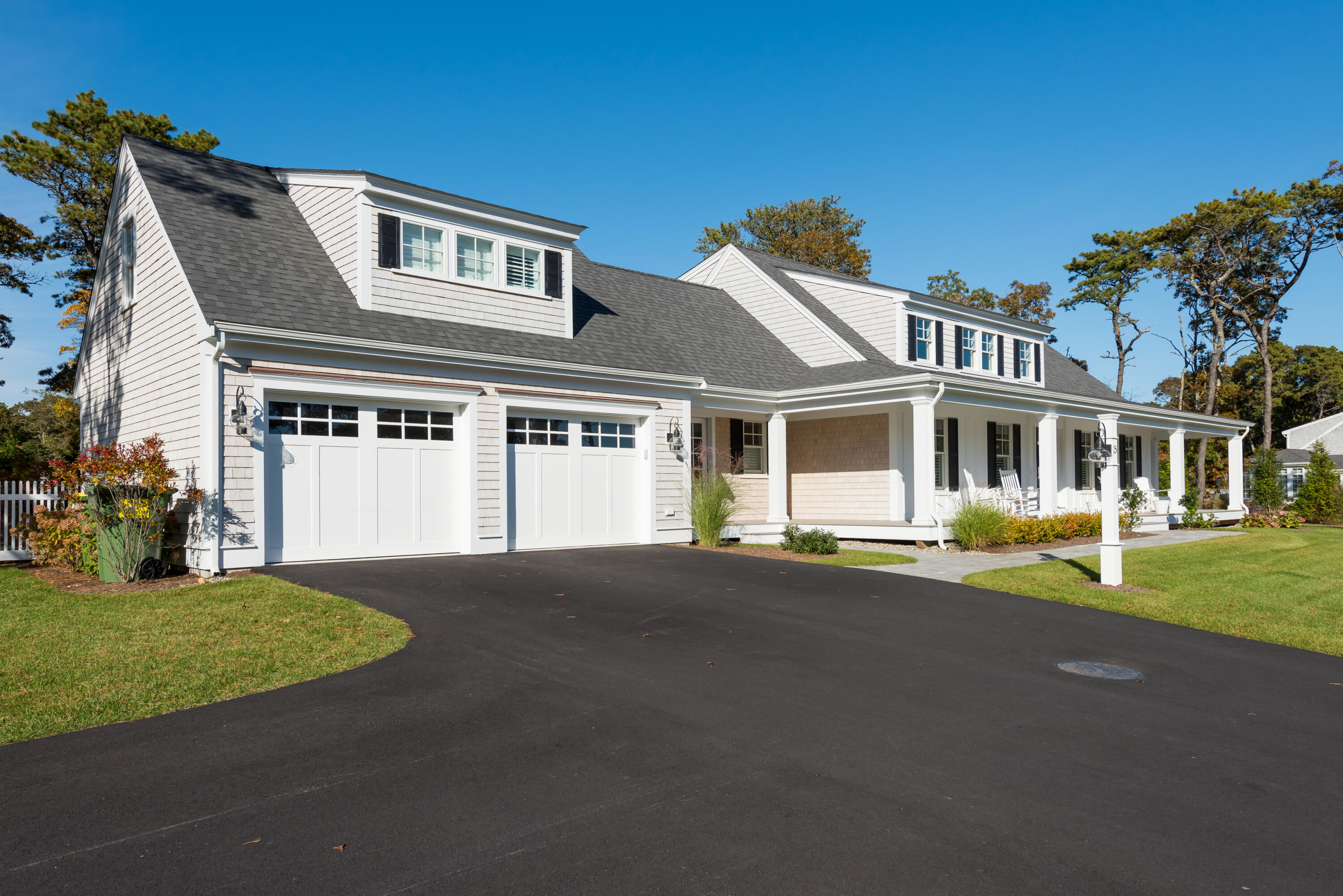 15 Bascom Hollow Harwich, MA 02645 - Photo 5 of 35 front view of a house with a yard