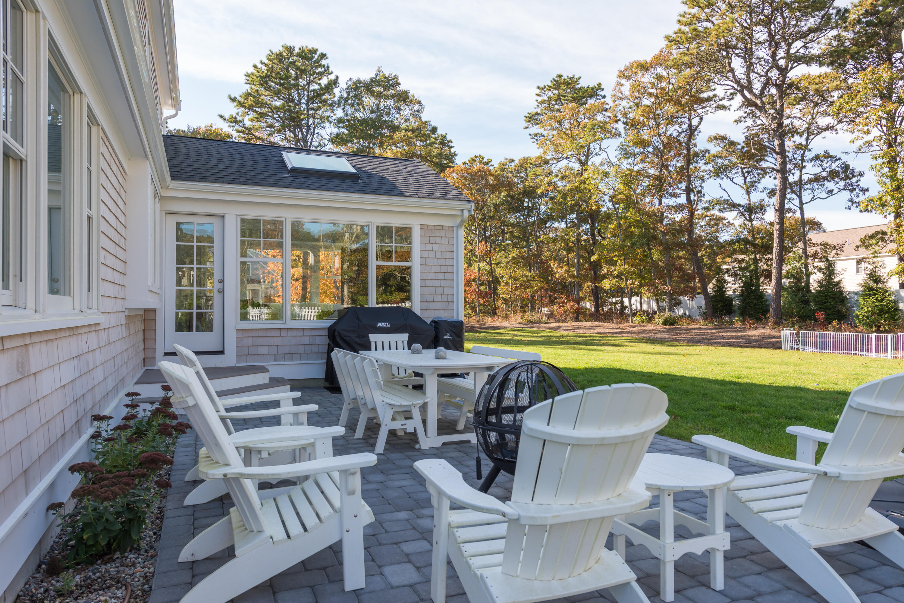 15 Bascom Hollow Harwich, MA 02645 - Photo 10 of 35 a view of a house with swimming pool and a chairs