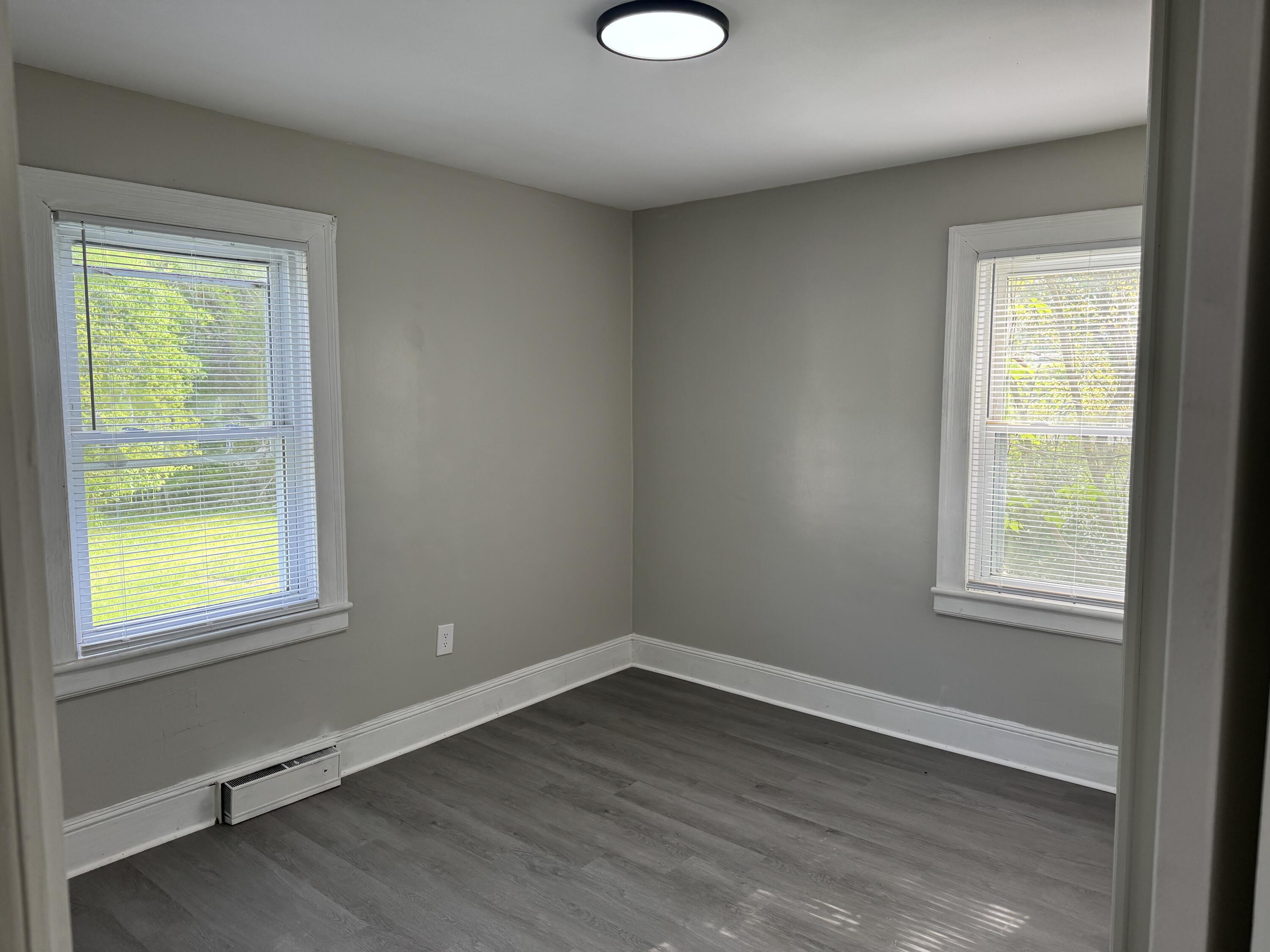 136 Nelson Avenue Danville, VA 24540 - Photo 3 of 7 an empty room with a window