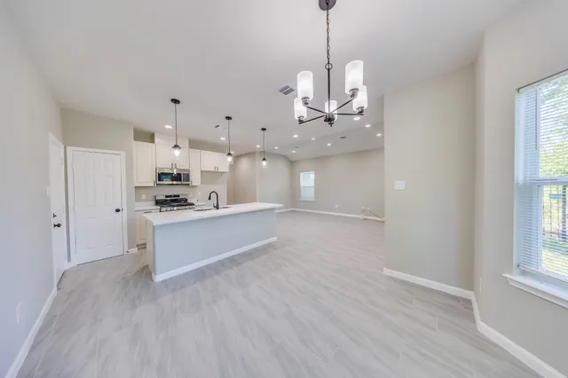 a view of a kitchen with window