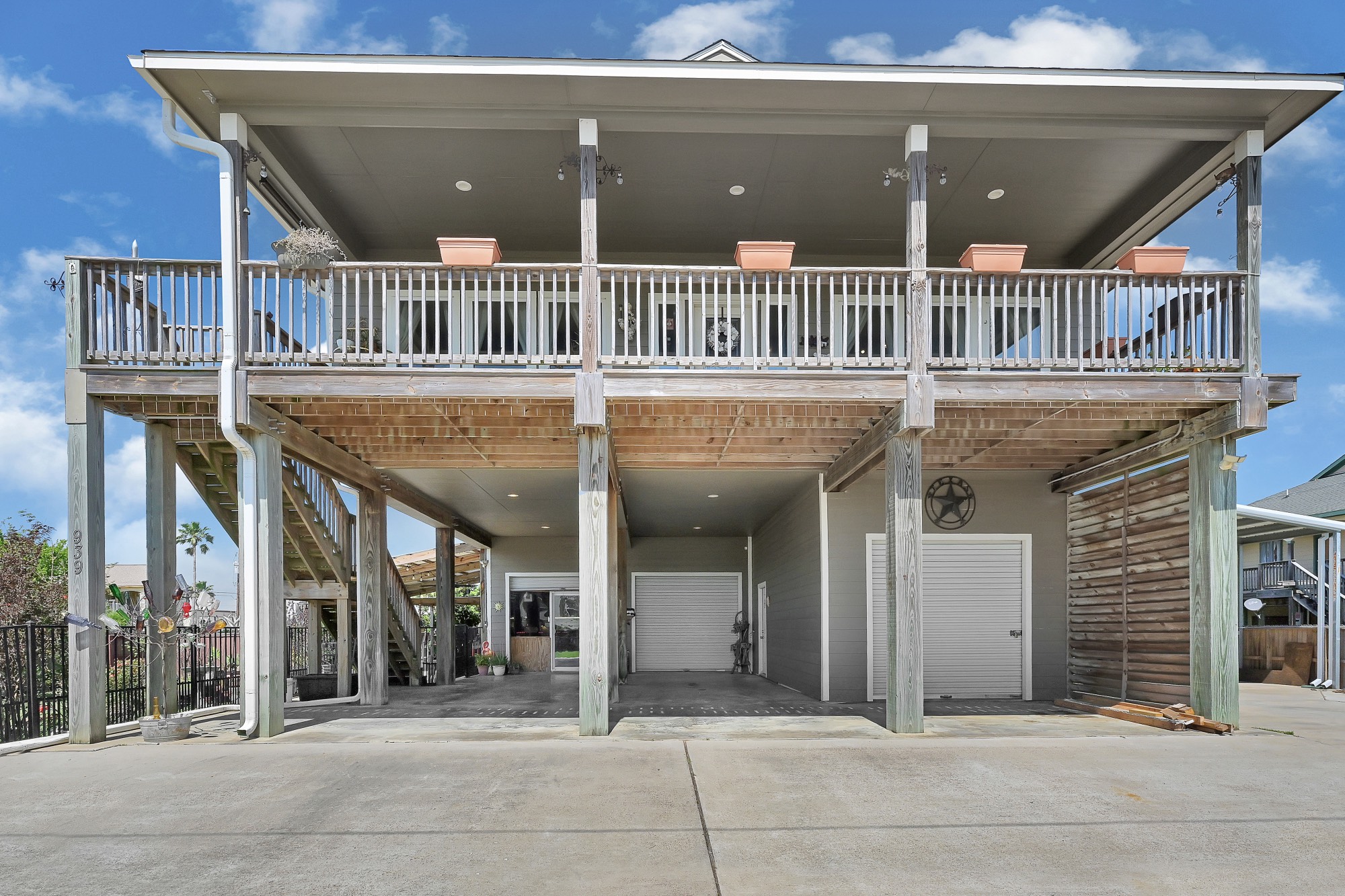 939 8th Street Dickinson, TX 77539 - Photo 6 of 31 Elevated two-story home with spacious covered parking and storage underneath. Man Cave downstairs as well as an unfinished mother in law's suite ready to put your personal touch on.