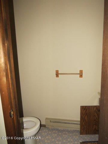 230 Selig Road Pocono Lake, PA 18347 - Photo 16 of 20 a bathroom with a toilet and a shower