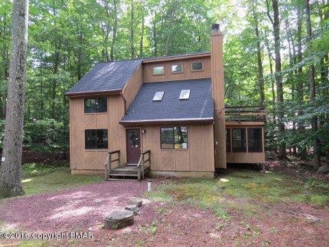 230 Selig Road Pocono Lake, PA 18347 - Photo 2 of 20 a front view of a house with garden