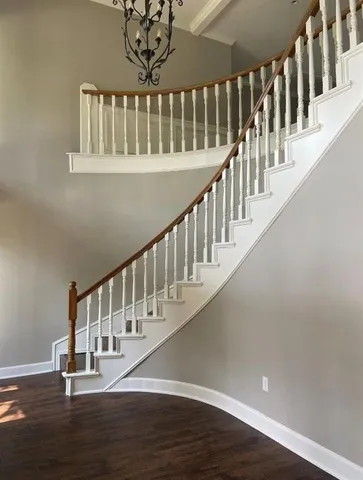 a view of entryway with wooden floor
