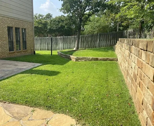a view of a garden with a slide