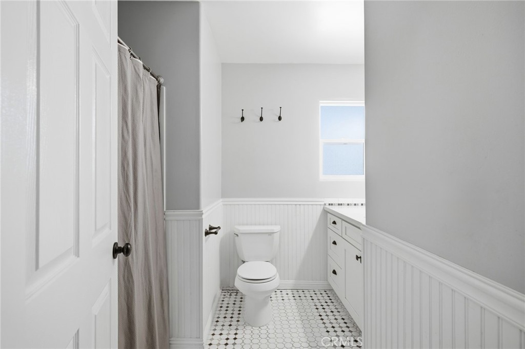 14010 Hilldale Road Valley Center, CA 92082 - Photo 14 of 28 a bathroom with a toilet and a shower