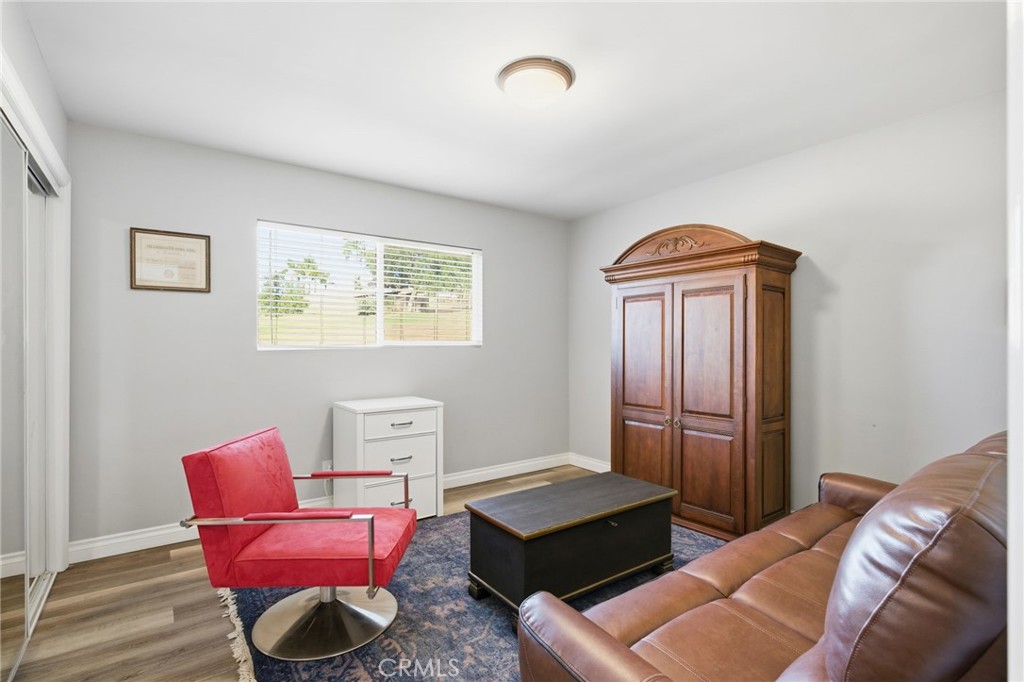 14010 Hilldale Road Valley Center, CA 92082 - Photo 16 of 28 a living room with furniture and a window