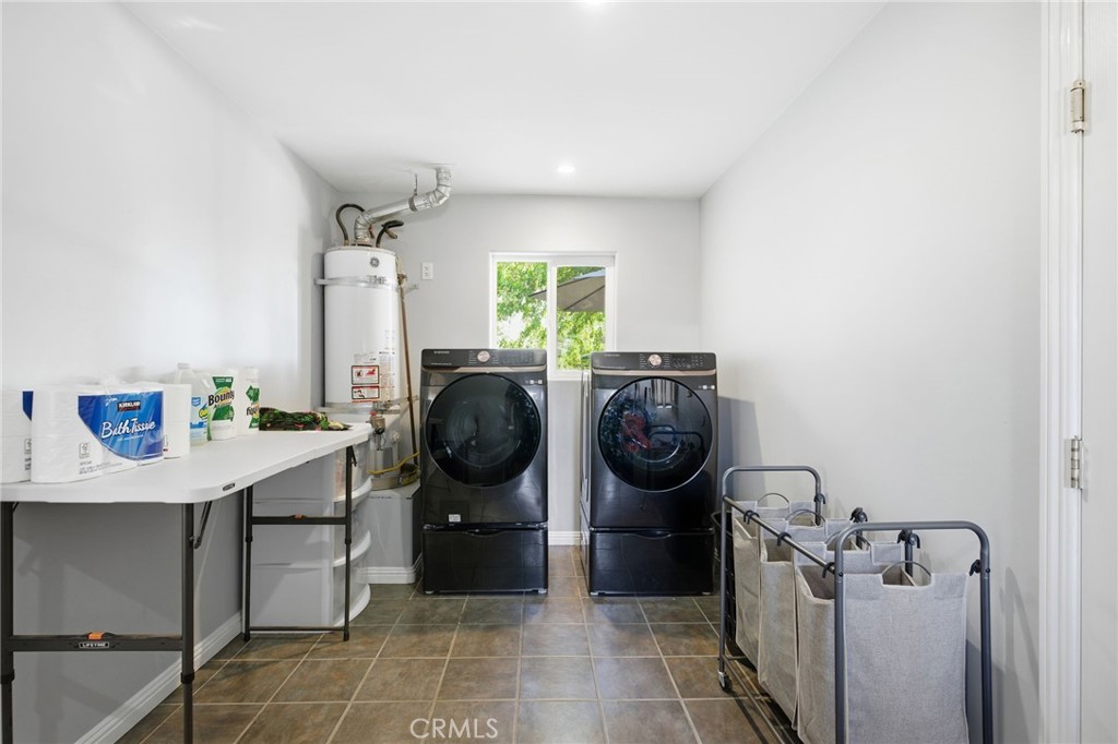 14010 Hilldale Road Valley Center, CA 92082 - Photo 20 of 28 a view of a storage & utility room with washer and dryer