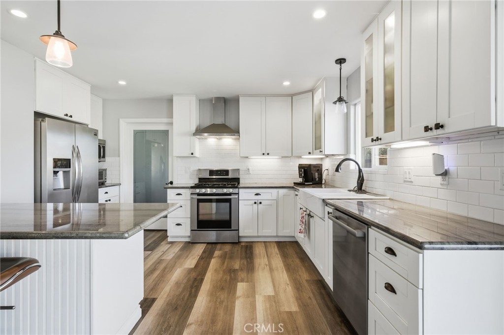 14010 Hilldale Road Valley Center, CA 92082 - Photo 5 of 28 a kitchen with stainless steel appliances granite countertop a sink stove and refrigerator