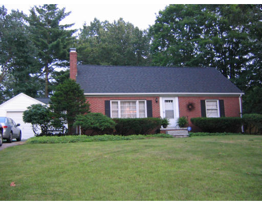 107 Newton Road Springfield, MA 01118 - Photo 1 of 17 a aerial view of a house with a yard
