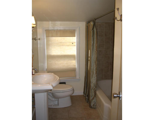 107 Newton Road Springfield, MA 01118 - Photo 12 of 17 a bathroom with a toilet and a shower