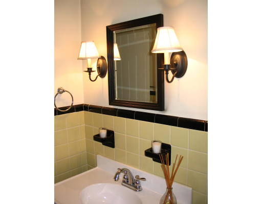 107 Newton Road Springfield, MA 01118 - Photo 13 of 17 a bathroom with a sink and mirror