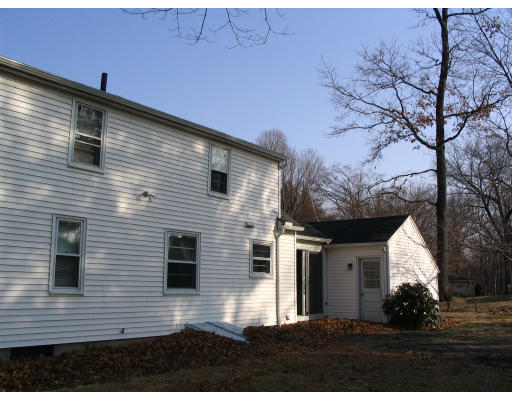 107 Newton Road Springfield, MA 01118 - Photo 16 of 17 a view of house and front view of a house