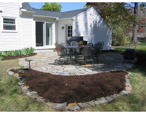 107 Newton Road Springfield, MA 01118 - Photo 2 of 17 a view of backyard of house with a patio