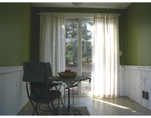 107 Newton Road Springfield, MA 01118 - Photo 9 of 17 a living room with furniture and a window