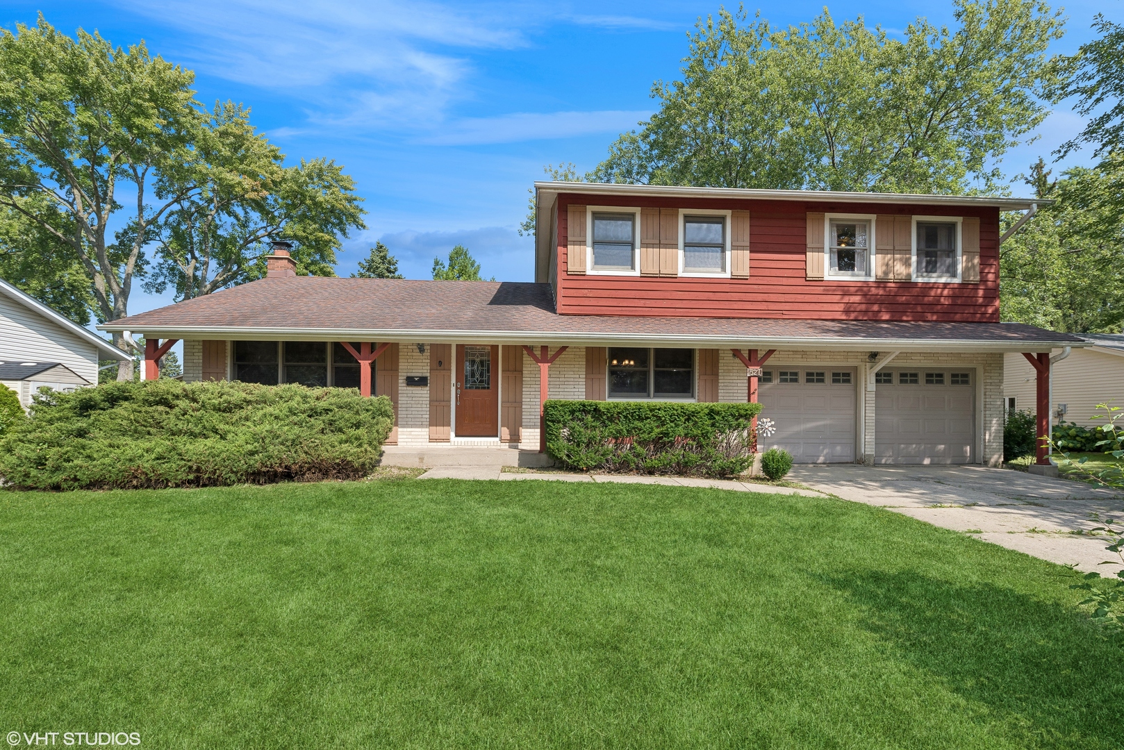 521 North Rohlwing Road Palatine, IL 60074 - Photo 1 of 19 a front view of a house with a yard
