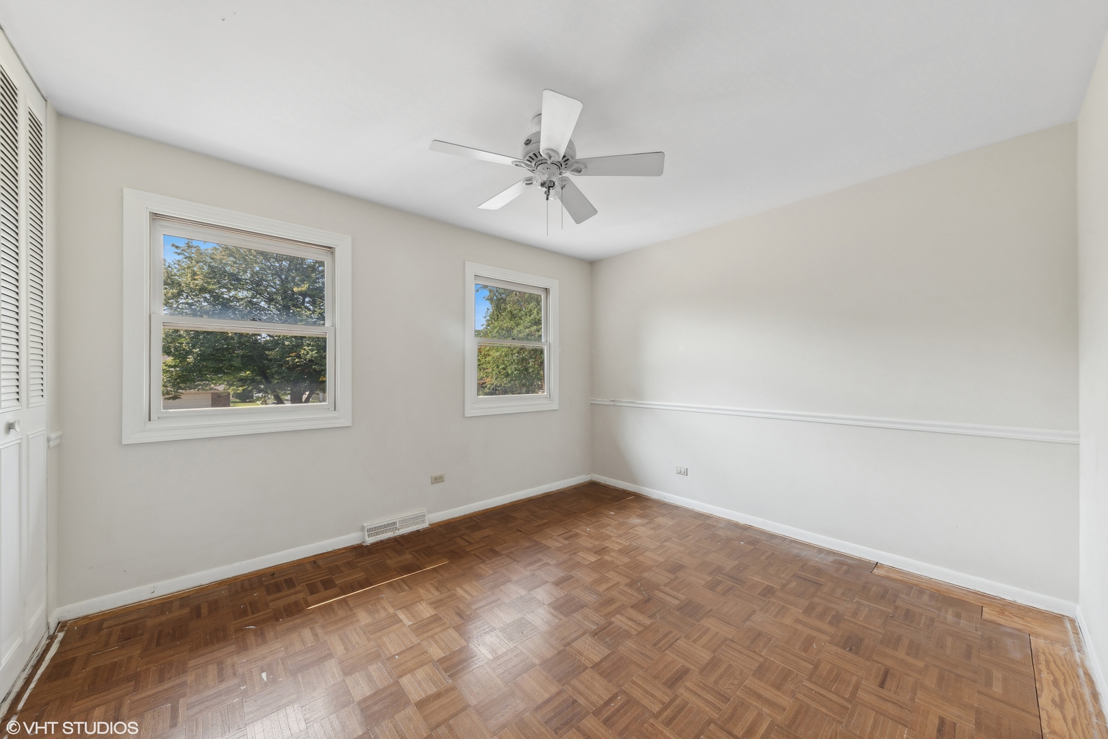 521 North Rohlwing Road Palatine, IL 60074 - Photo 14 of 19 an empty room with windows and fan