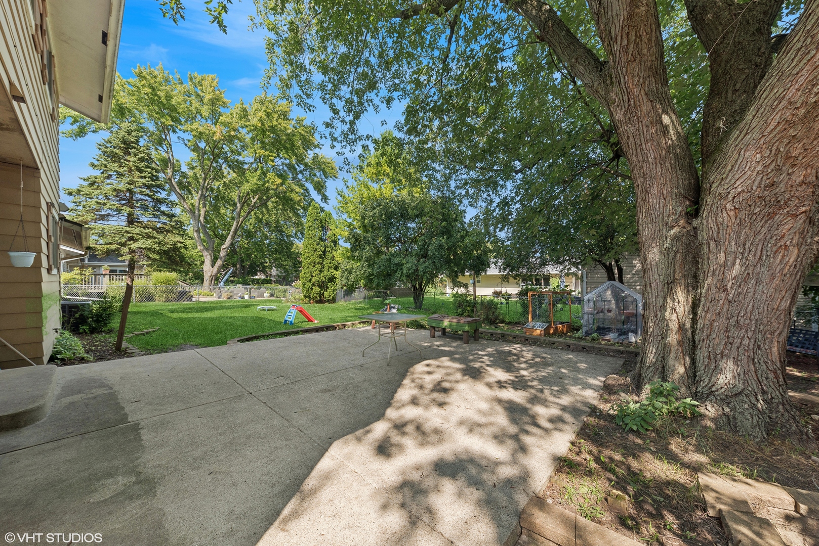 521 North Rohlwing Road Palatine, IL 60074 - Photo 18 of 19 a view of a street with a trees