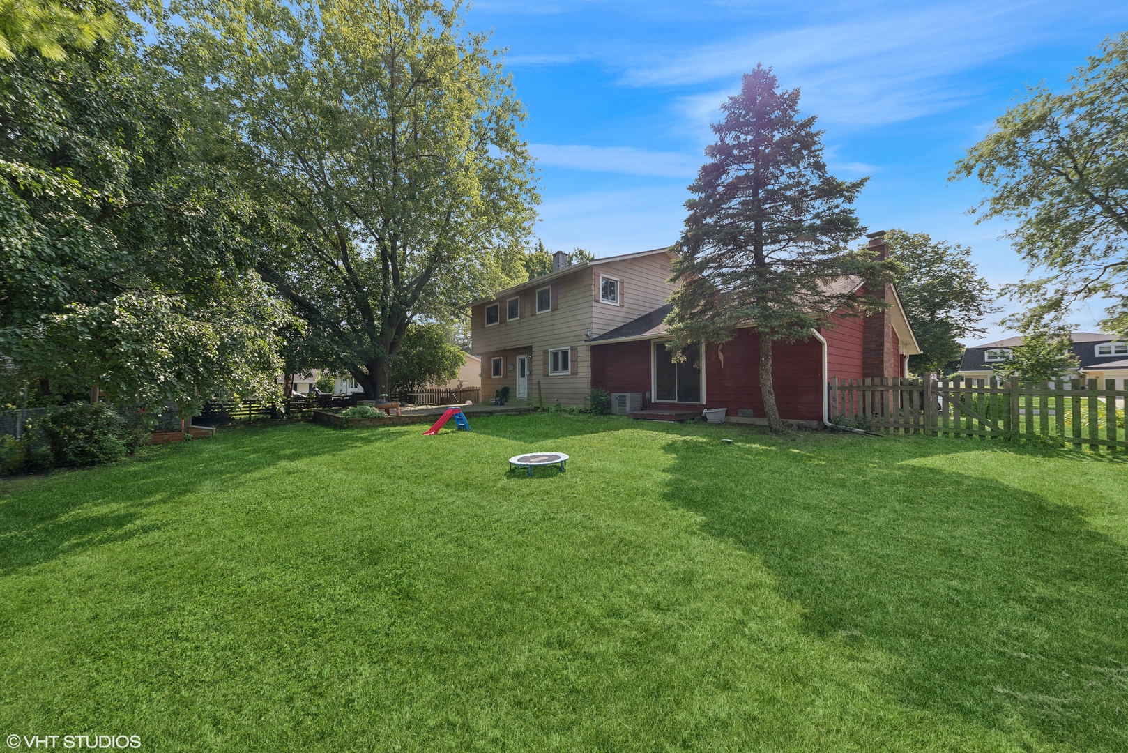 521 North Rohlwing Road Palatine, IL 60074 - Photo 19 of 19 a view of a house with backyard and garden