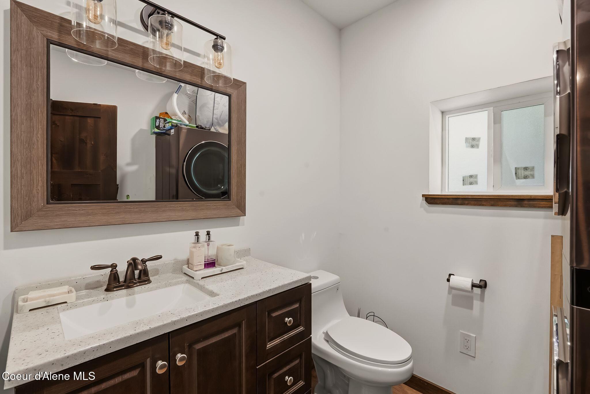 3566 Upper Gold Creek Road Sandpoint, ID 83864 - Photo 8 of 21 Half Bath with Washer and Dryer