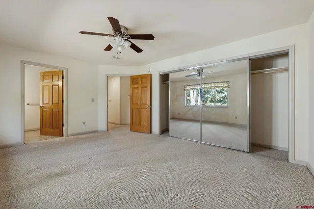 a view of empty room with windows