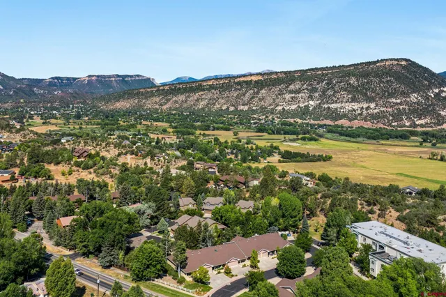 an aerial view of residential building and lake view