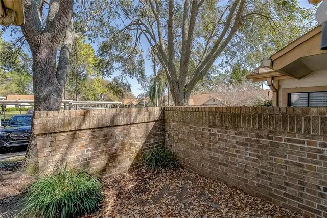 a bath room with a toilet and a bath tub