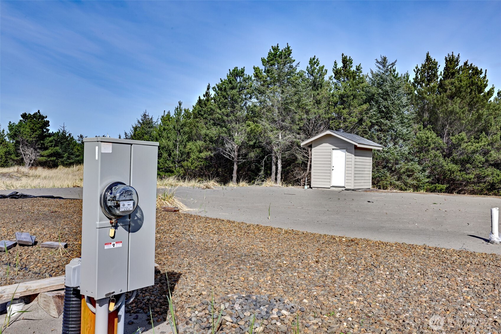 16151 Pacific Way Long Beach, WA 98631 - Photo 17 of 23 a view of a back yard with a house