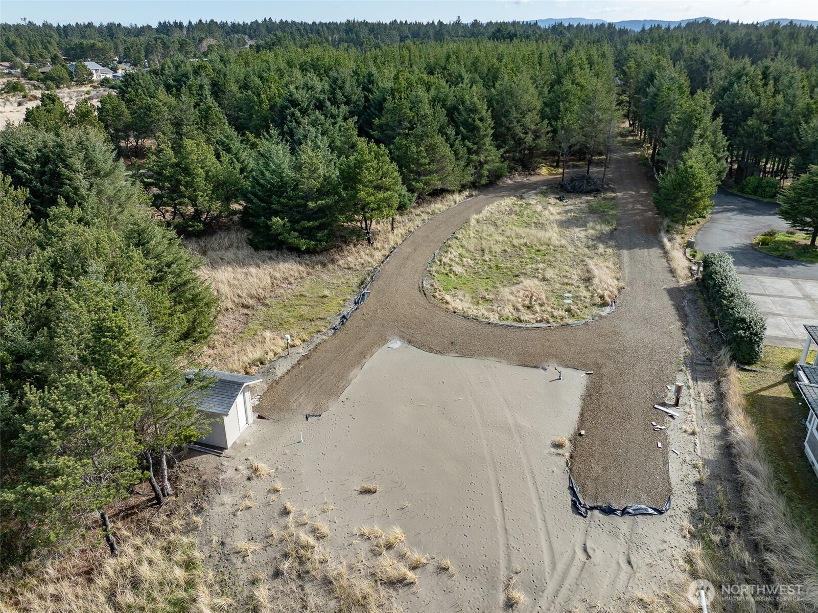 16151 Pacific Way Long Beach, WA 98631 - Photo 2 of 23 an aerial view of a house with yard