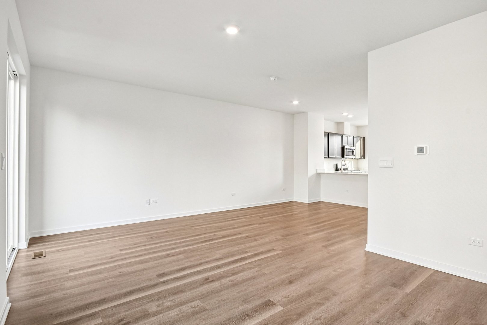 373 Summit Circle Lombard, IL 60148 - Photo 12 of 45 a view of empty room with wooden floor