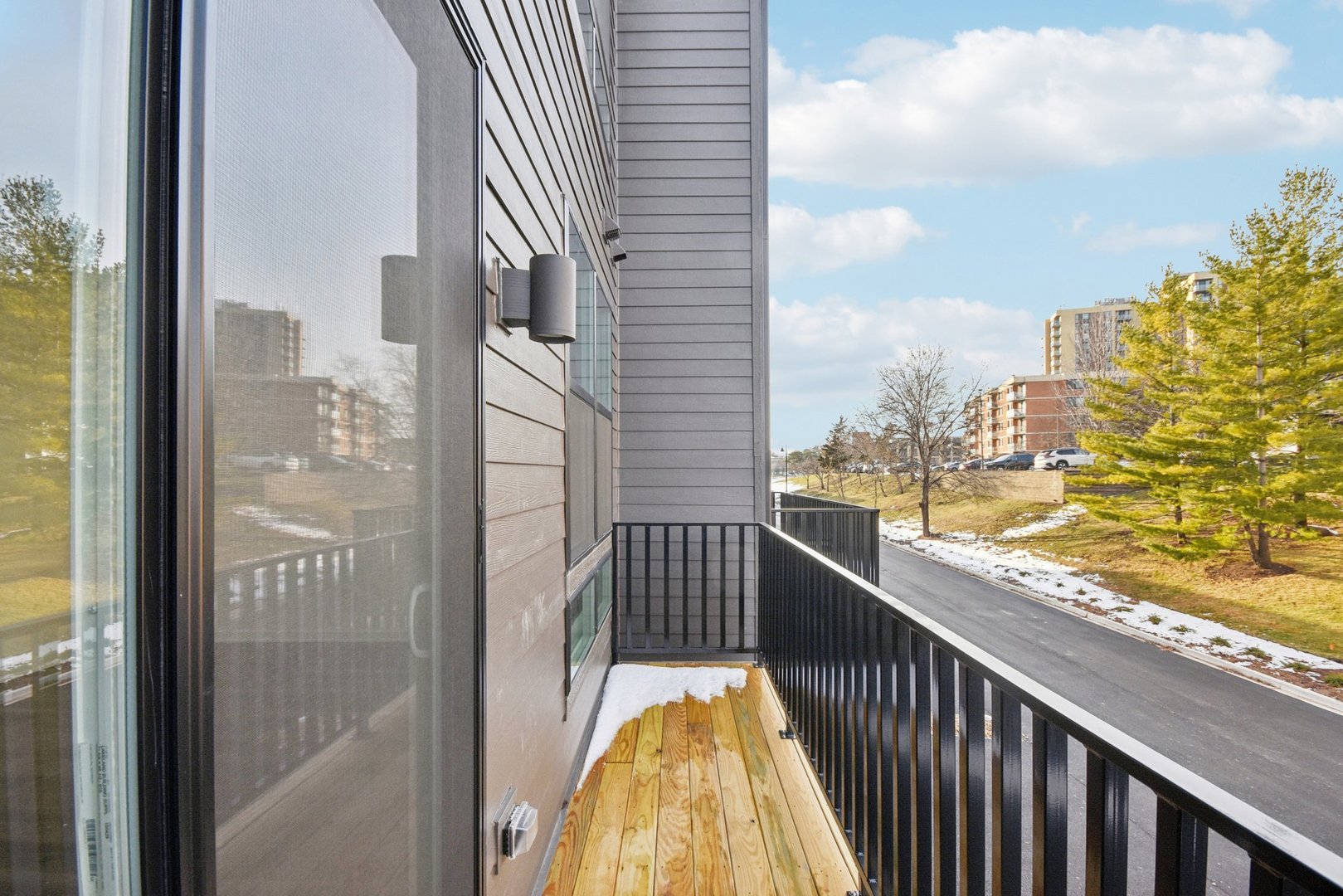 373 Summit Circle Lombard, IL 60148 - Photo 14 of 45 a view of balcony with floor to ceiling windows with wooden floor