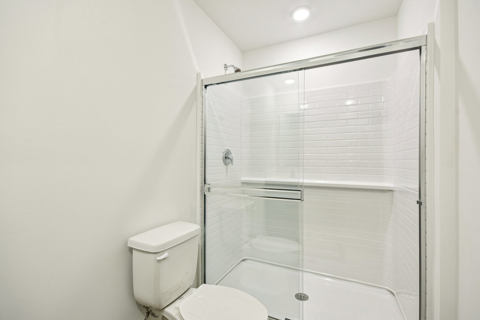 373 Summit Circle Lombard, IL 60148 - Photo 20 of 45 a bathroom with a shower and a toilet