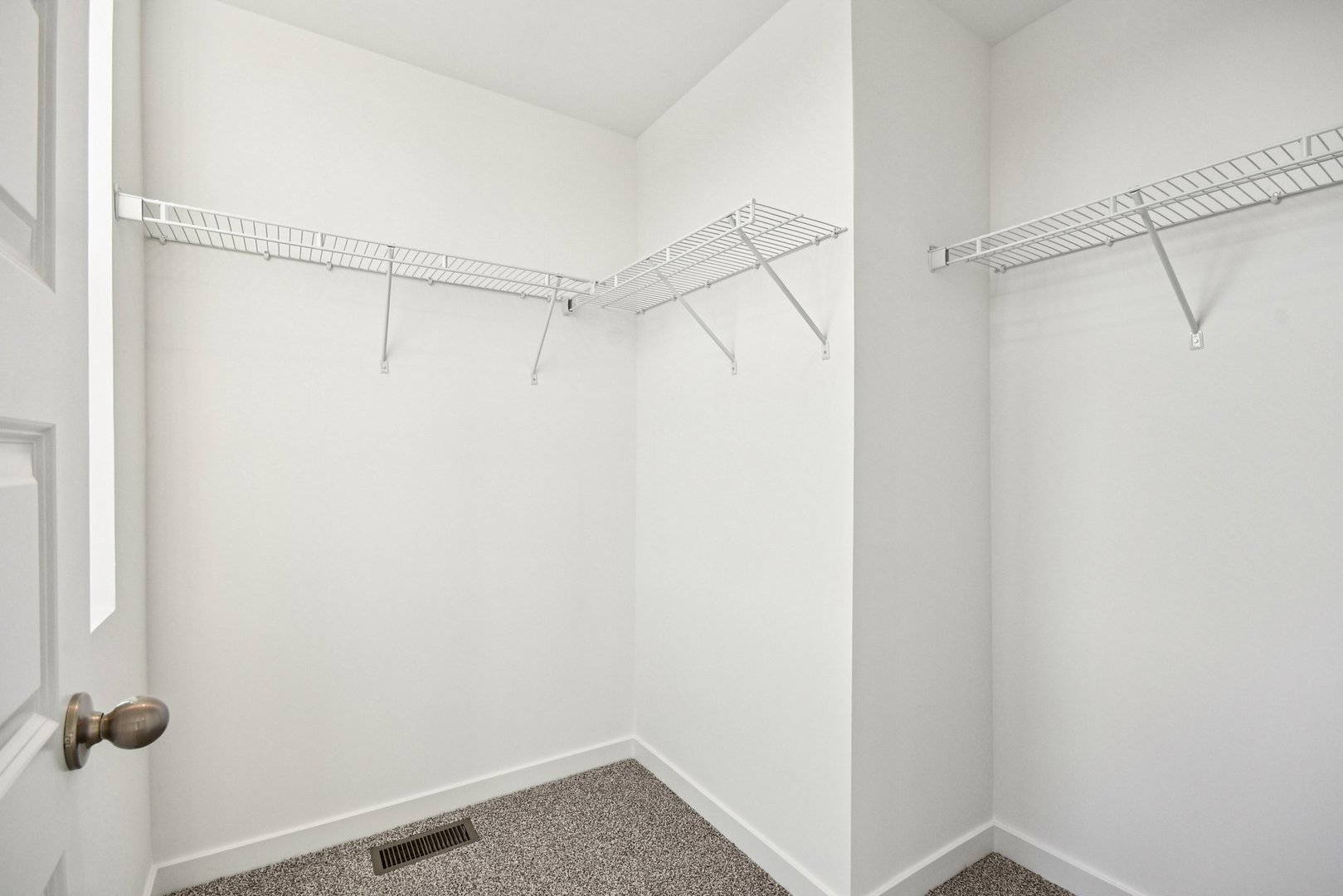 373 Summit Circle Lombard, IL 60148 - Photo 21 of 45 a view of a room with racks on the wall