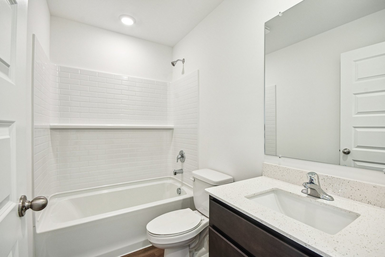 373 Summit Circle Lombard, IL 60148 - Photo 24 of 45 a bathroom with a bathtub shower sink vanity mirror and toilet