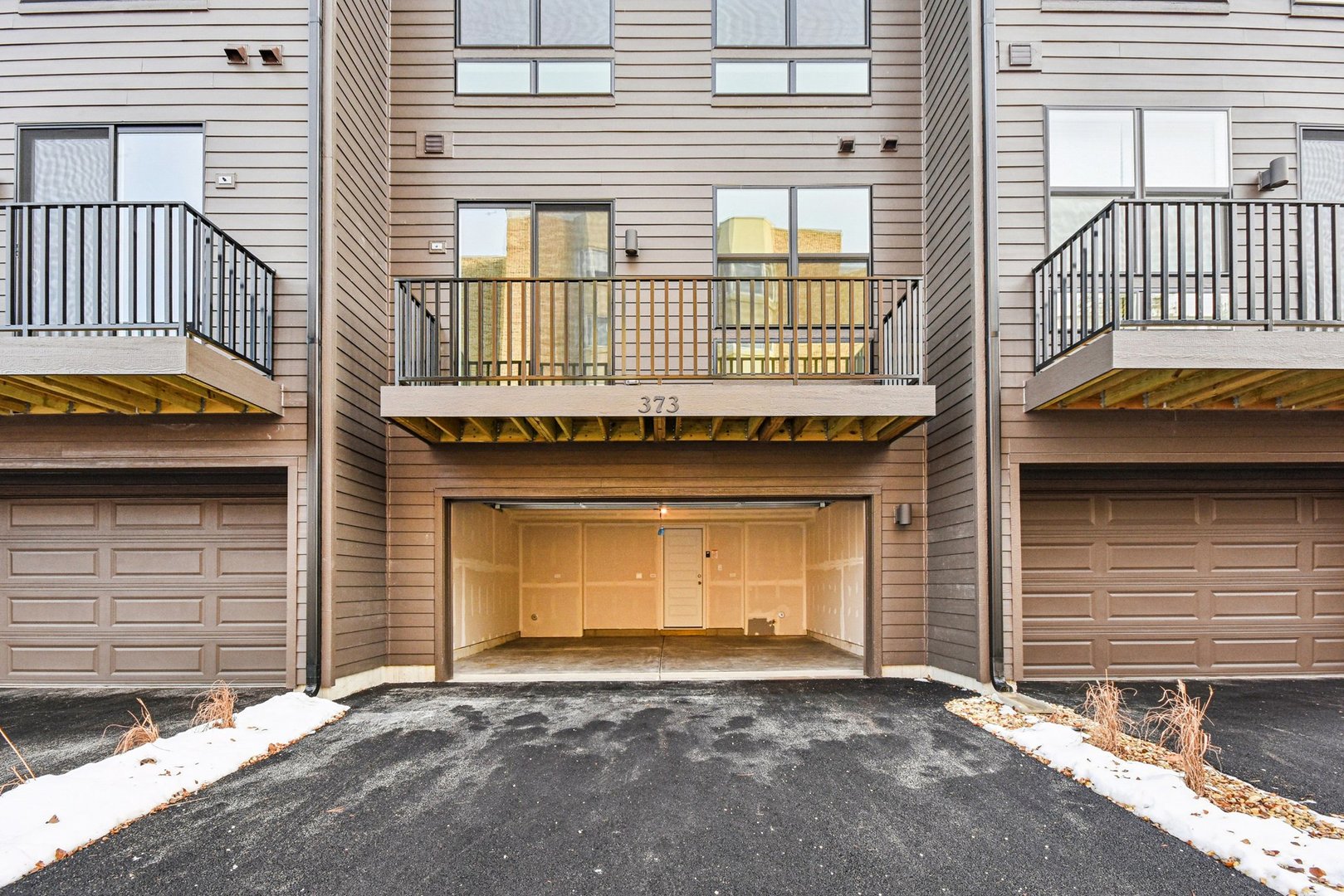 373 Summit Circle Lombard, IL 60148 - Photo 30 of 45 a front view of a house with a garage