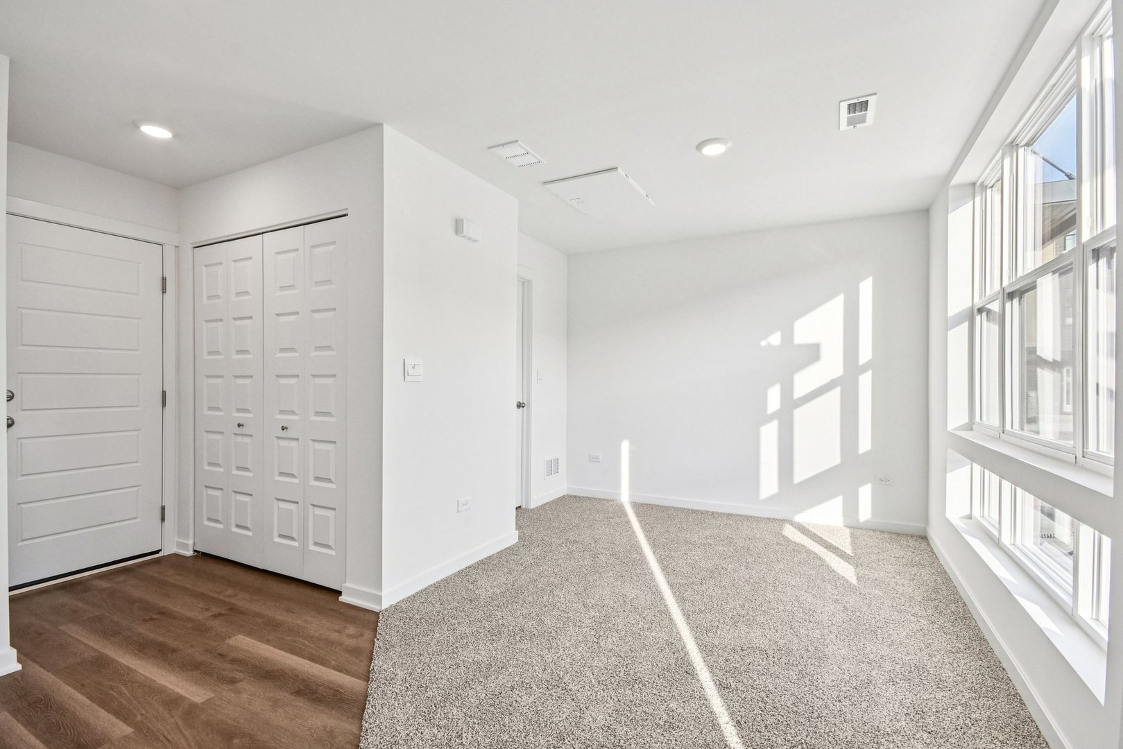 373 Summit Circle Lombard, IL 60148 - Photo 4 of 45 wooden floor in an empty room with a window