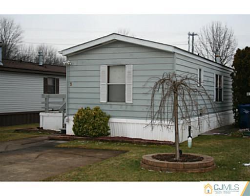3 Shelley Road North Brunswick, NJ 08902 - Photo 2 of 3 a front view of a house with a yard