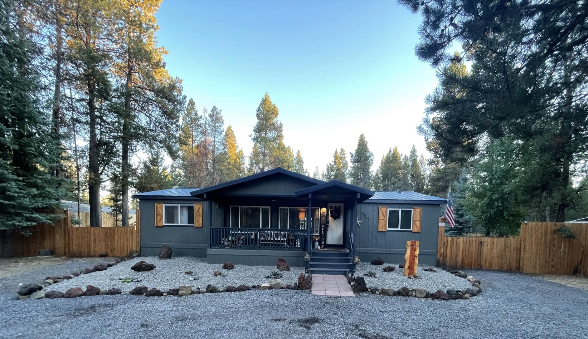 17317 Jacinto Road Bend, OR 97707 - Photo 1 of 25 a front view of a house with a yard