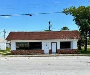 a front view of a house with a garage
