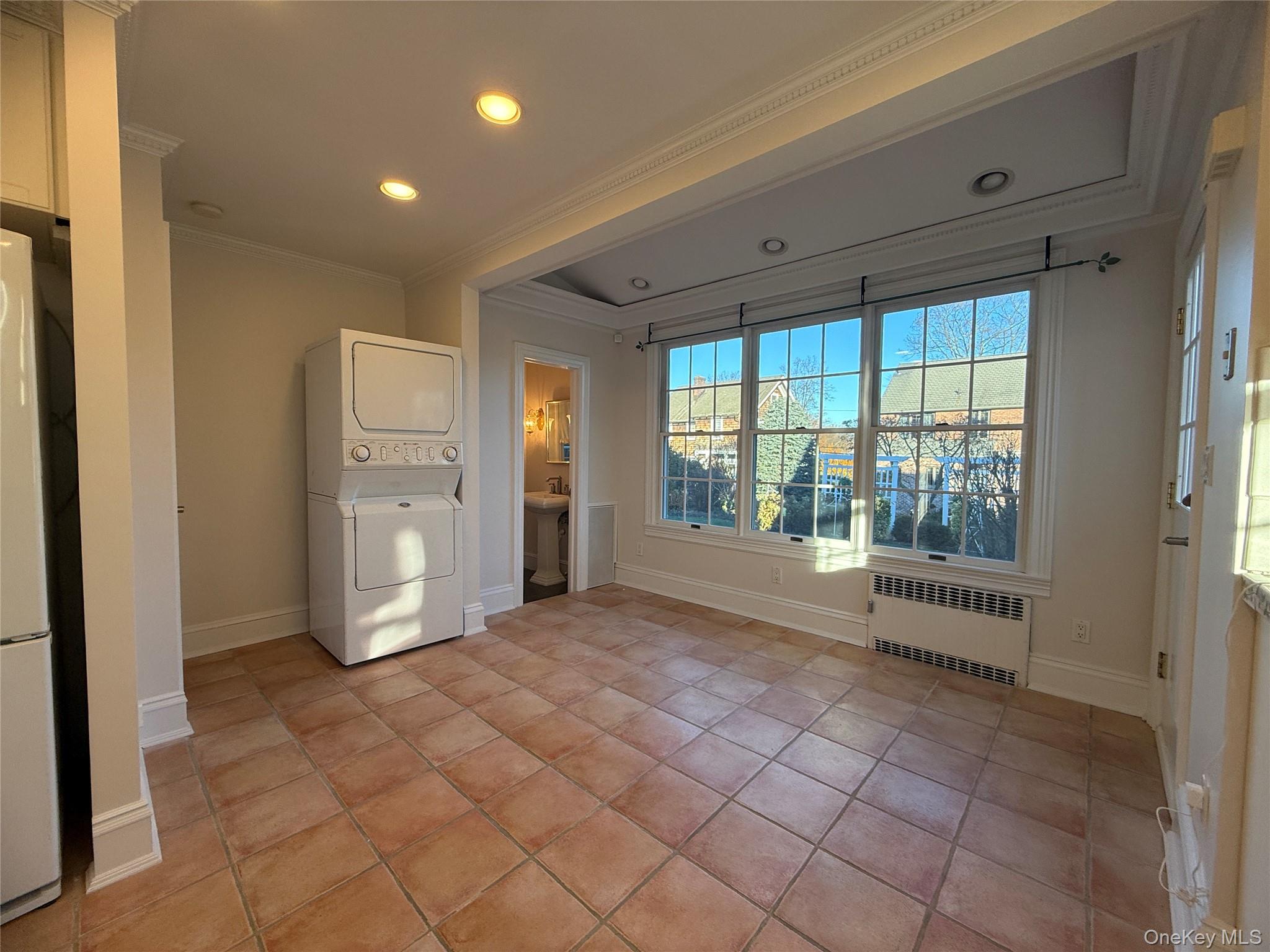 71 Hillcrest Avenue Manhasset, NY 11030 - Photo 11 of 23 a view of an empty room with a window