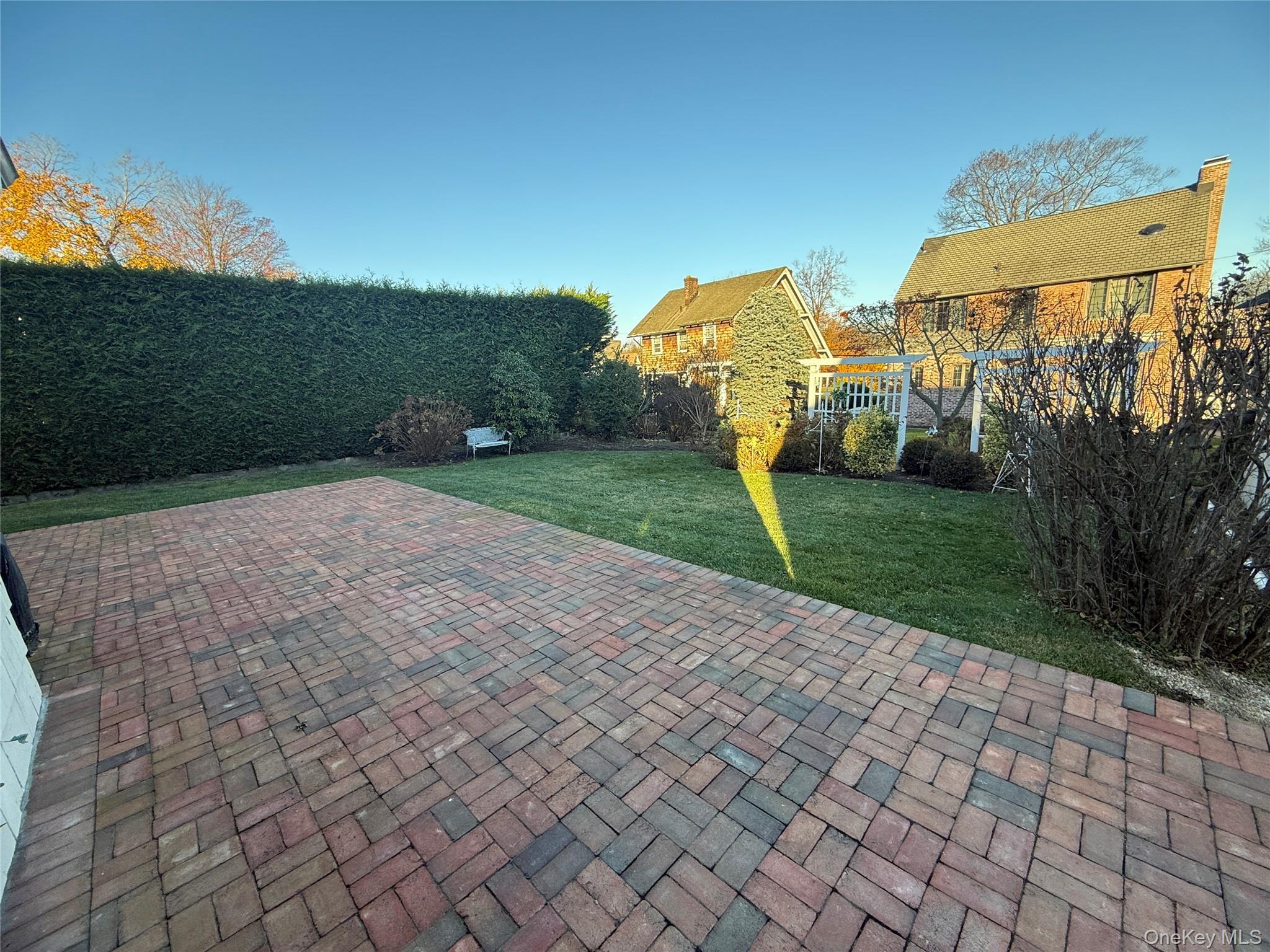 71 Hillcrest Avenue Manhasset, NY 11030 - Photo 21 of 23 a view of a park with large trees