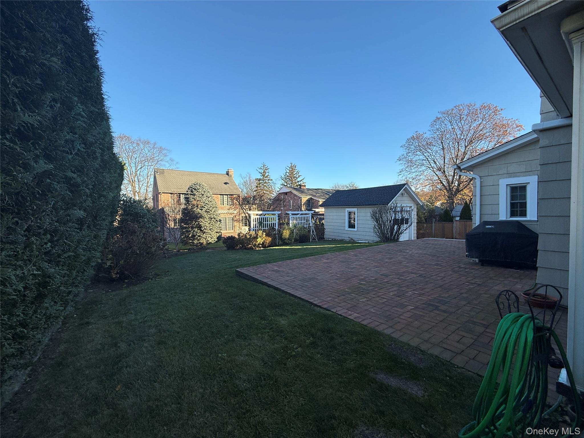 71 Hillcrest Avenue Manhasset, NY 11030 - Photo 23 of 23 a view of outdoor space and yard