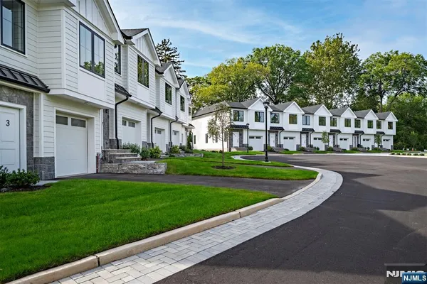a view of a street with houses