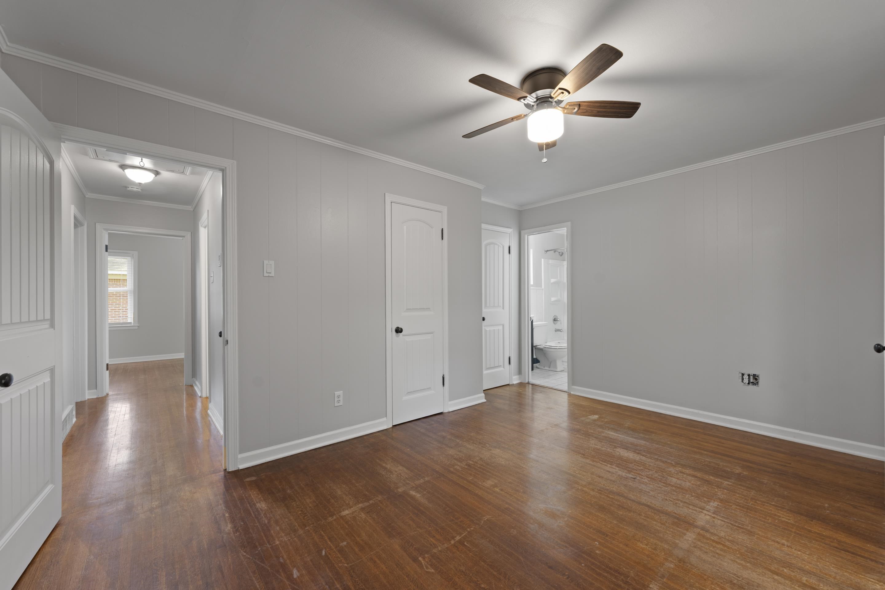1603 Colonial Road Memphis, TN 38117 - Photo 14 of 24 a view of an empty room with wooden floor