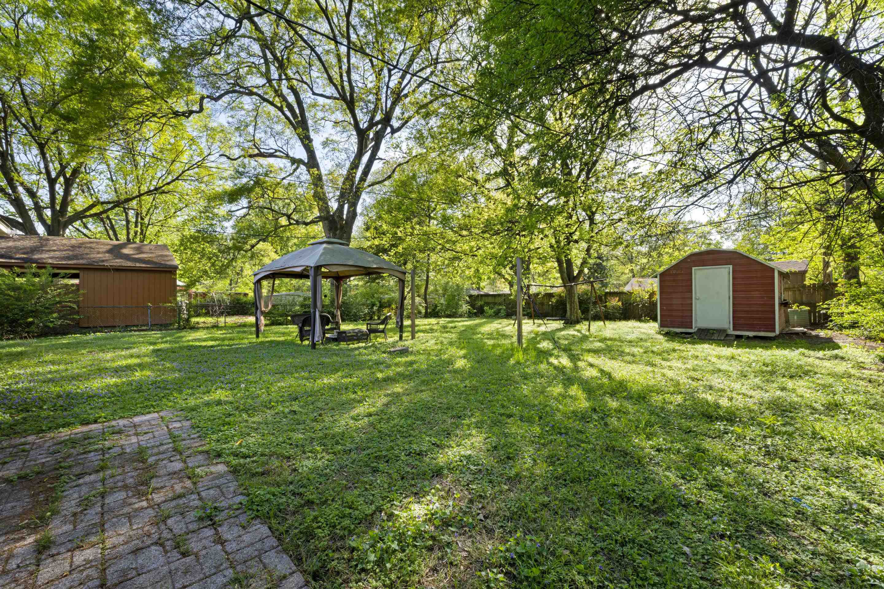 1603 Colonial Road Memphis, TN 38117 - Photo 23 of 24 a view of a backyard with a garden