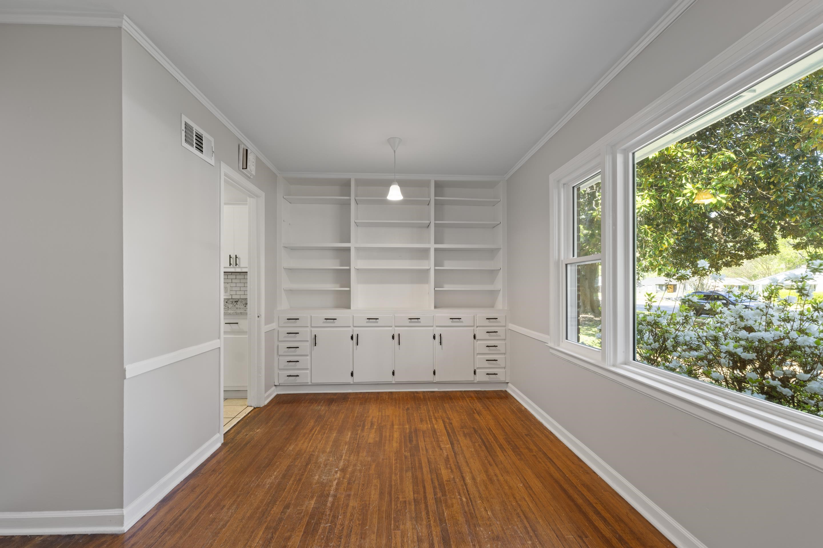 1603 Colonial Road Memphis, TN 38117 - Photo 6 of 24 a view of wooden floor in an empty room