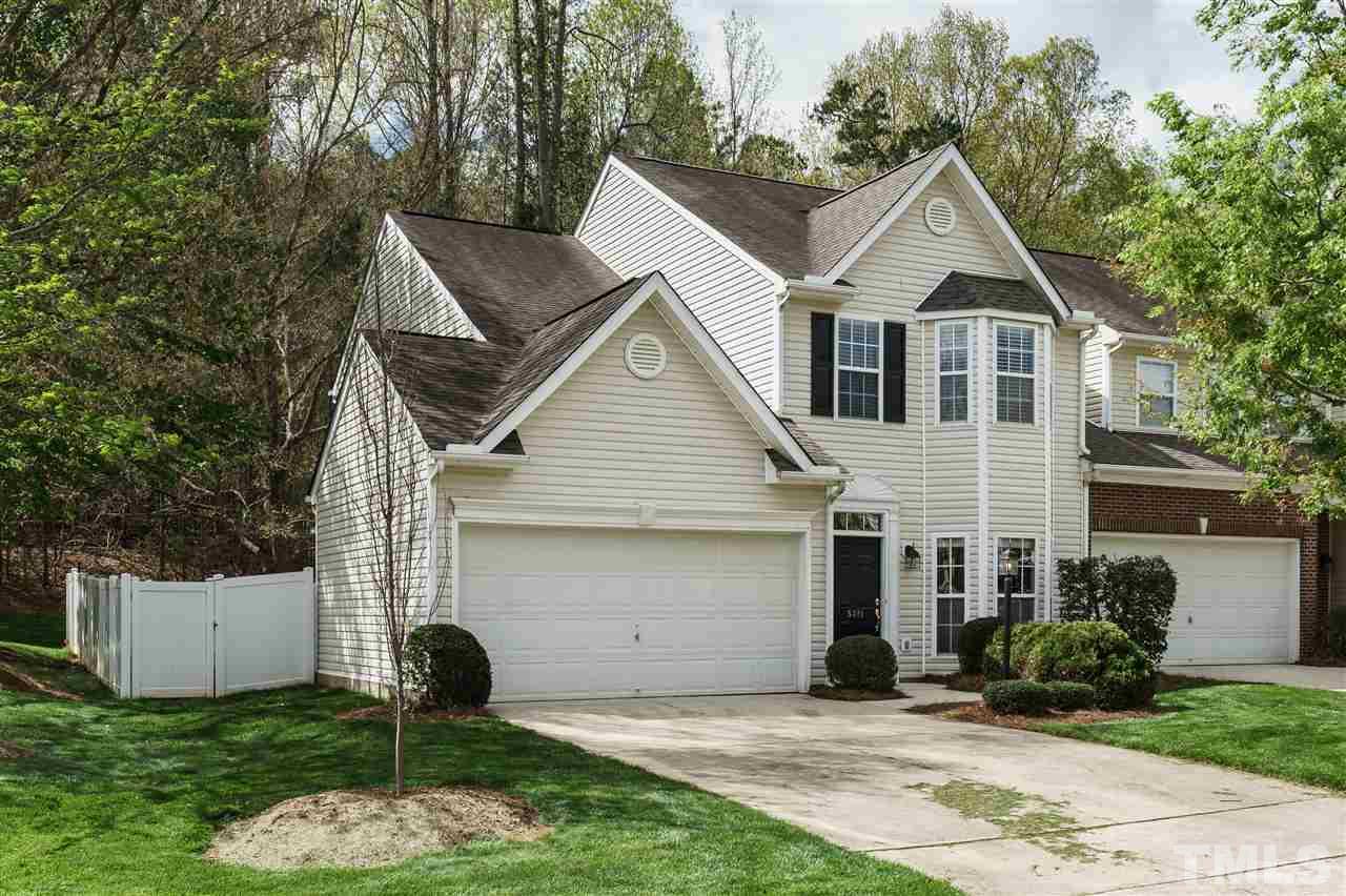 5301 Eolian Court Raleigh, NC 27607 - Photo 1 of 25 Gate to access the backyard on left side of the garage