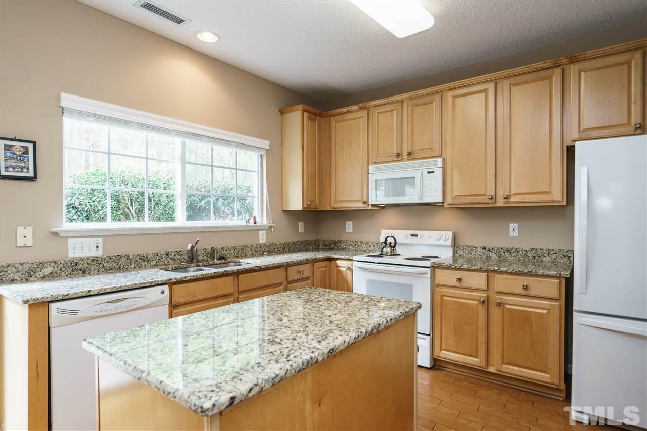 5301 Eolian Court Raleigh, NC 27607 - Photo 14 of 25 sellers upgraded the Granite countertop and a recently prurchased the refrigerator & it will convey