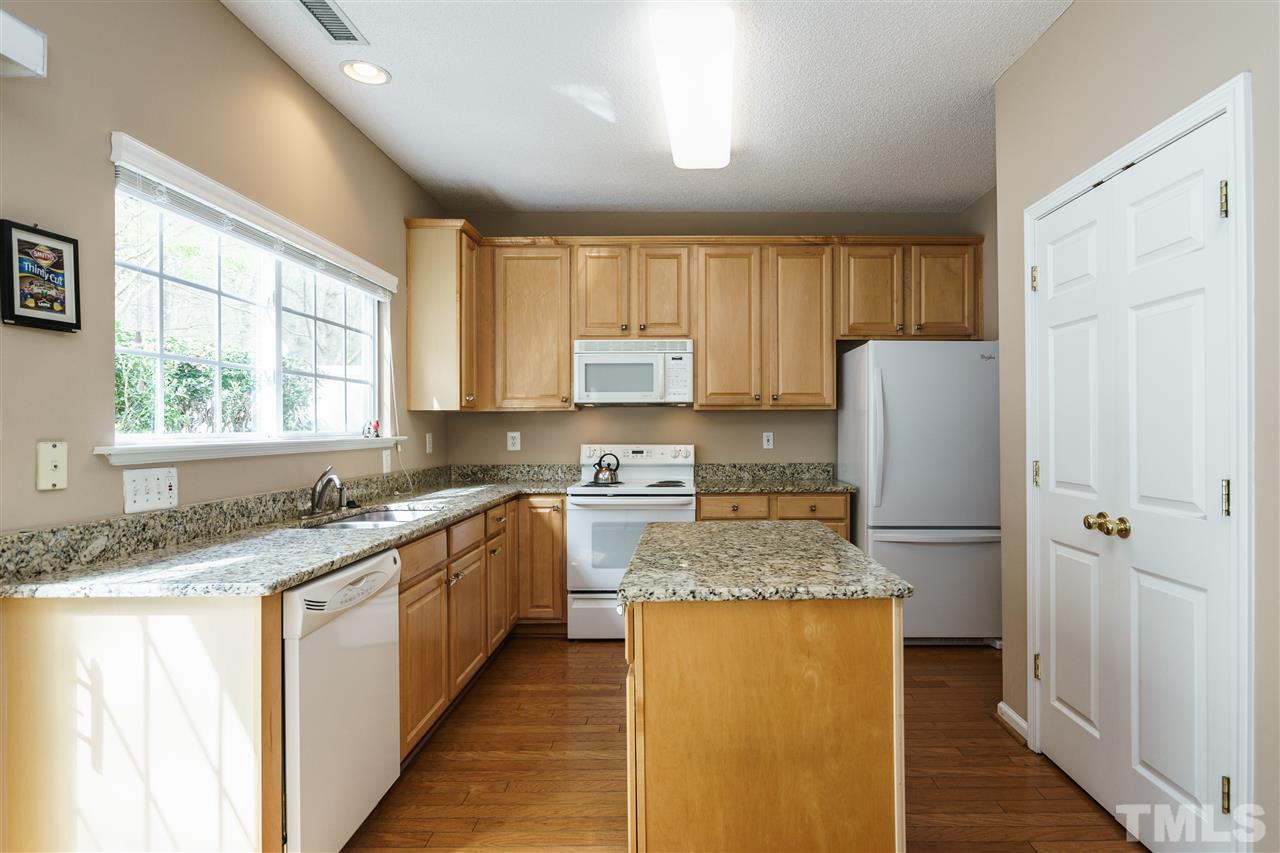 5301 Eolian Court Raleigh, NC 27607 - Photo 15 of 25 Another view of the kitchen,double doors on the right are the pantry