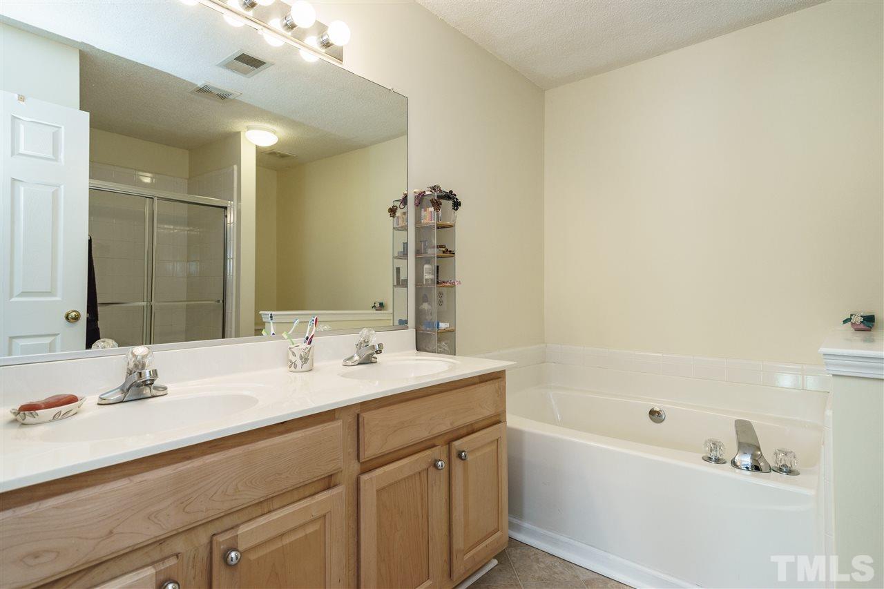 5301 Eolian Court Raleigh, NC 27607 - Photo 19 of 25 Master Bath has double sinks, separate tub & shower